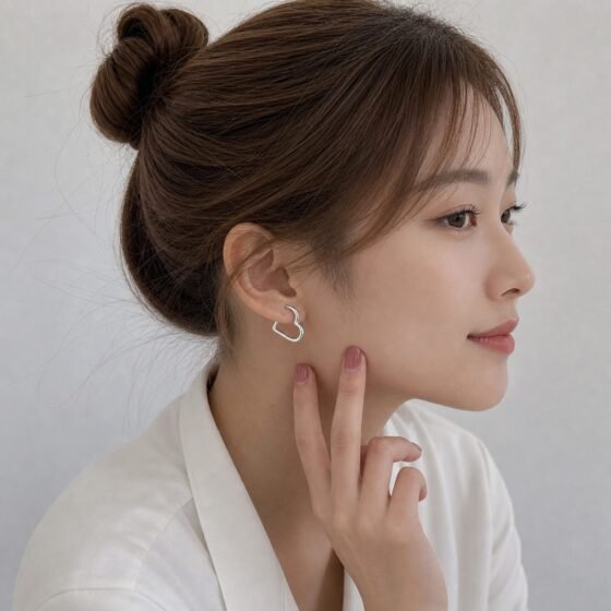 Heart Sculptural Hoop Earrings - view 1